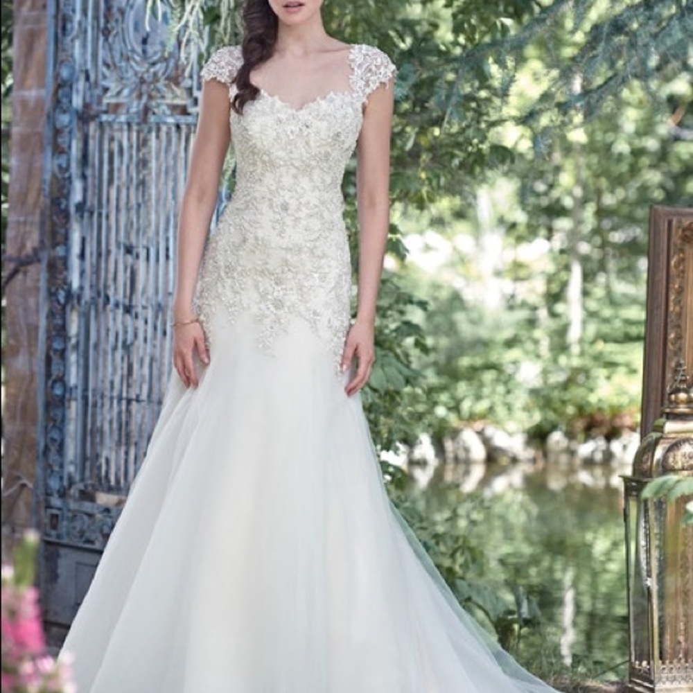 Never worn or altered Maggie Sottero Wedding Dress